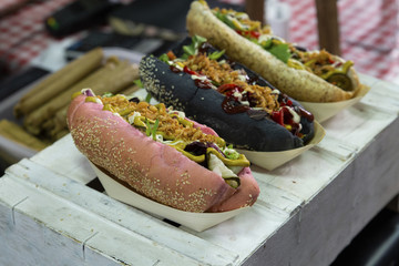 close up on three type of vegan hot dogs - Powered by Adobe