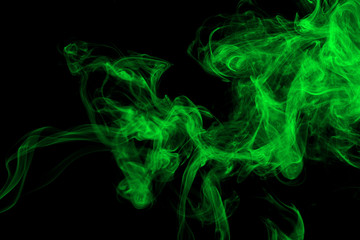 Green smoke on black background