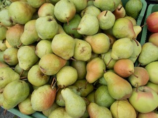 fresh apples and pears on a market