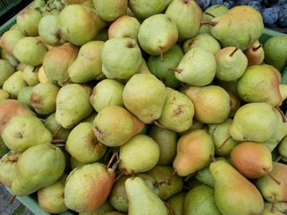 fresh apples and pears on a market
