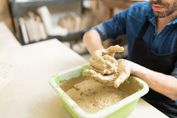 Man Doing Preparation Of Making Art Product In Pottery Workshop
