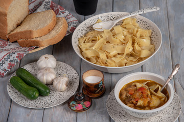 Pasta in meat sauce with stewed vegetables