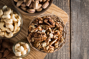 mix of nuts on a wooden table