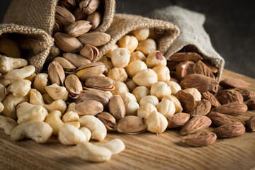 mix of nuts on a wooden table
