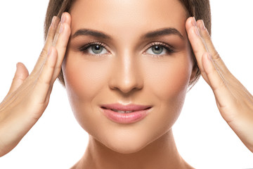 Obraz premium Portrait of young beautiful woman in studio