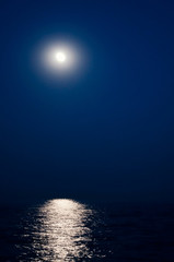 beautiful moonlit walk on the sea