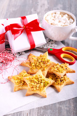 Crunchy pistachio christmas star biscuits