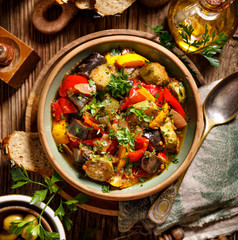 Ratatouille, Vegetarian stew made of zucchini, eggplants, peppers, onions, garlic and tomatoes with...