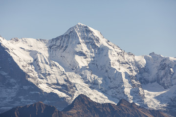 Mountain moench with the Jungfraujoch in the Bernese Oberland in Switzerland