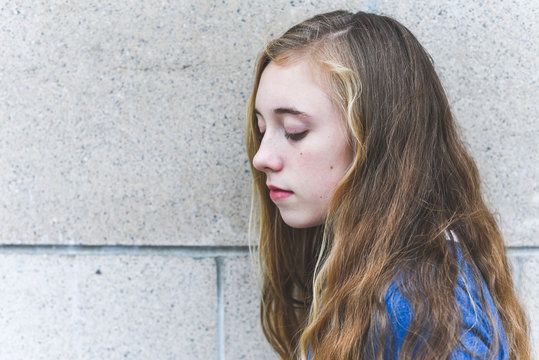 Close-up of depressed teenage girl.