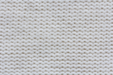 knitted fabric texture. reverse stockinette stitch pattern.