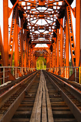 Sunset on the railway bridge. Evening