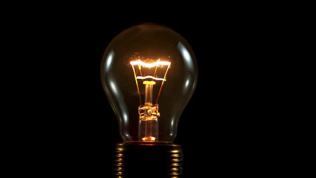 Super slow motion of light bulb explosion isolated on black background. 2000 fps