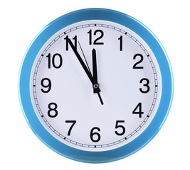 Wall clock isolated on white background. Five to twelve