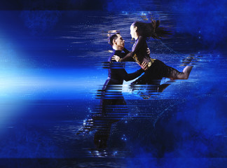 Pair of dancers dancing ballroom