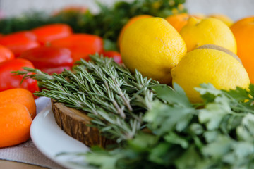 Obraz na płótnie Canvas Set of vegetables and fruits lying on the table