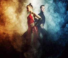 Pair of dancers dancing ballroom