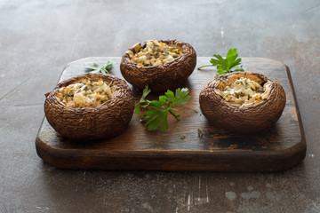 Mushrooms stuffed with cheese and greens