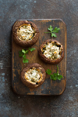 Mushrooms stuffed with cheese and greens