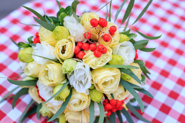 Wedding bouquet and wedding rings. The concept of celebrating, tradition, love, decor.