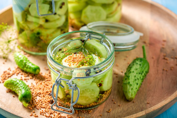 Natural and healthy pickled cucumber in the jar