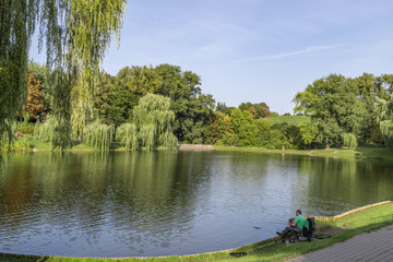 Green park and lake in Warsaw
