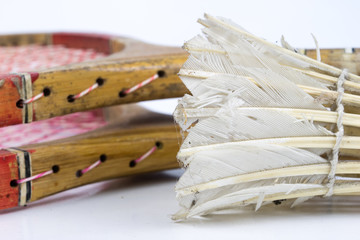 Old badminton accessories on a light table. Set for outdoor games and games.