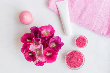 Spa background with pink flowers and bath salt