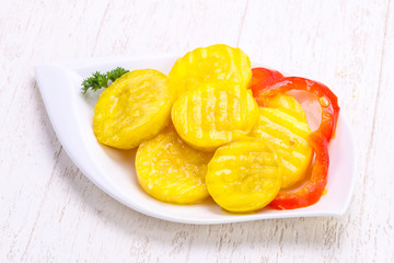Pickled zucchini in the bowl