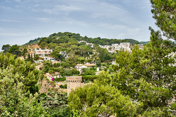 Fototapeta premium Beach at Tossa de Mar and fortress in a beautiful summer day, Costa Brava, Catalonia, Spain