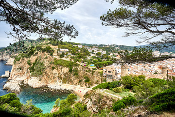 Beach at Tossa de Mar and fortress in a beautiful summer day, Costa Brava, Catalonia, Spain