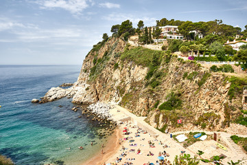 Beach at Tossa de Mar and fortress in a beautiful summer day, Costa Brava, Catalonia, Spain