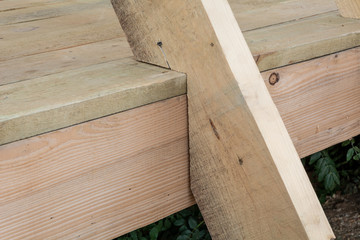 Wood frame residential construction site at sunset, Ukraine.
