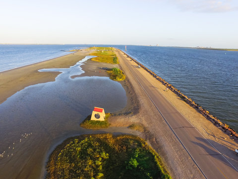 Aerial view famous Texas City Dike, a levee that projects nearly 5miles south-east into mouth of Galveston Bay. It was designed to reduce the impact of sediment accumulation along the lower Bay