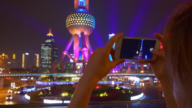 night shanghai downtown famous tower mobile phone tourist look panorama 4k china
