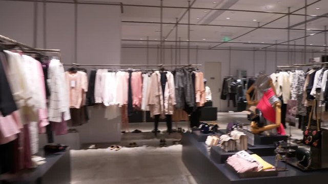 shanghai city famous mall fashion store interior slow motion panorama 4k china
