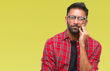 Adult hispanic man wearing glasses over isolated background thinking looking tired and bored with depression problems with crossed arms.