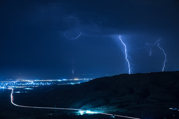 Summer storm bringing thunder, lightnings and rain.