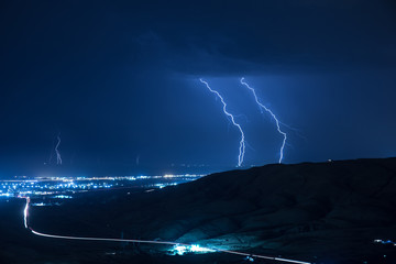 Summer storm bringing thunder, lightnings and rain.