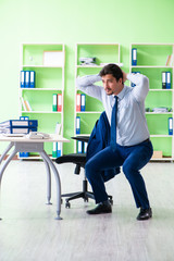 Employee doing exercises during break at work