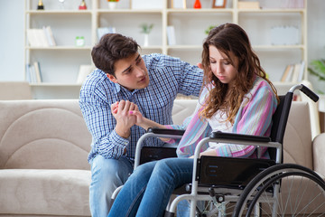 Desperate disabled person on wheelchair