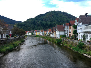 Fototapeta na wymiar The canal refreshes the homes of the Black Forest