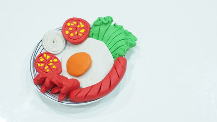 Breakfast egg with saucesage and vegetable has copy space
