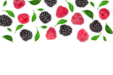 blackberry and raspberry with leaves isolated on white background with copy space for your text....