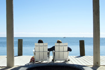 Fototapeta premium Couple Looking At The Sea