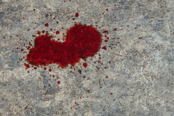 Blood on cement floor.
