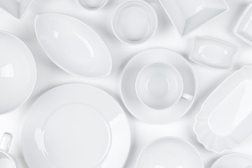 Empty, clean white assorted dishware white background