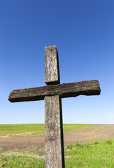 top of an old wooden cross