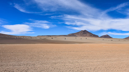 Fototapeta na wymiar Rock formations and volcanic landscapes of the Salvador Dali Desert, Reserva Eduardo Avaroa, Sud Lipez province, Bolivia