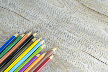Fototapeta premium color pencils on a wooden floor // still life